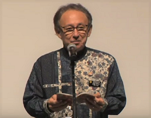 写真:シンポジウムに出席している玉城知事