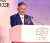 写真：沖縄・ラオス国口唇口蓋裂患者支援センター 会長　仲真良性